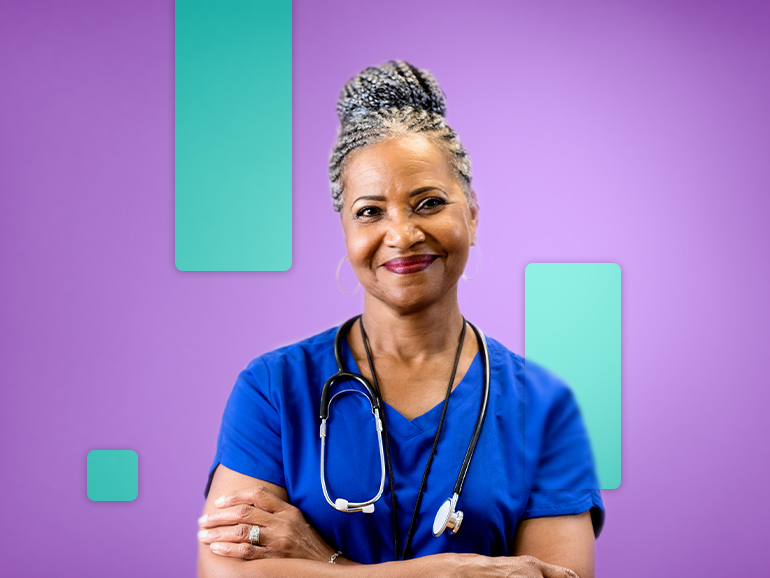 female nurse wearing blue scrubs with stethoscope