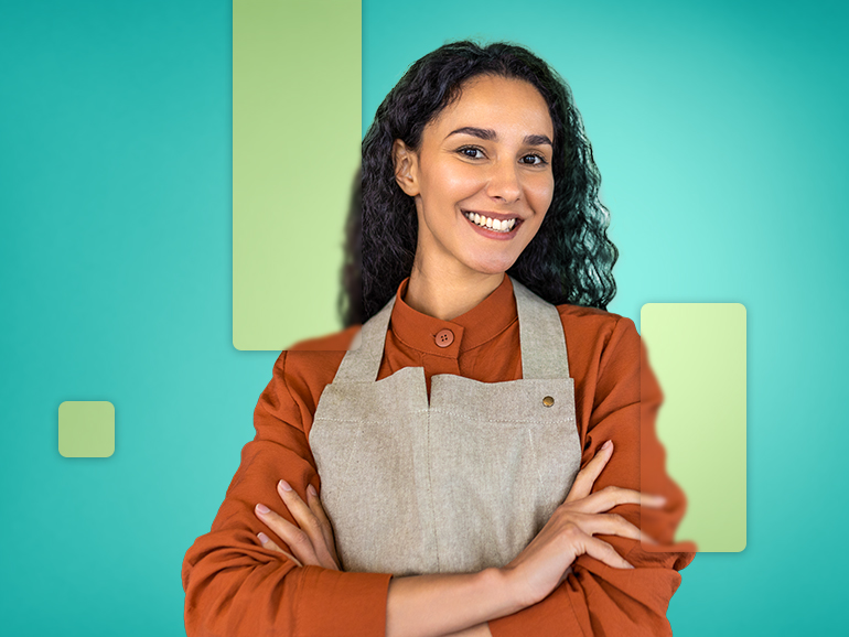 female salesperson wearing muslin apron