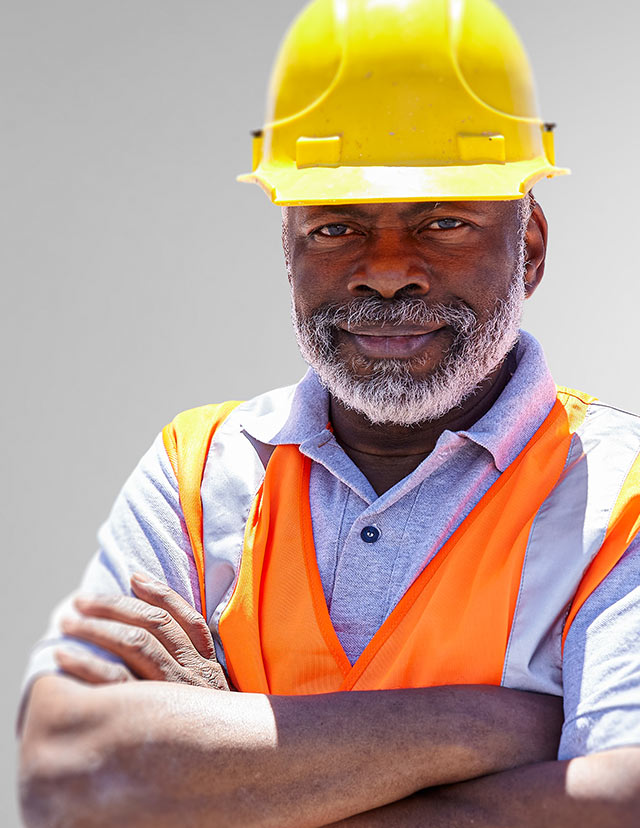 man wearing a safety vest and hardhat