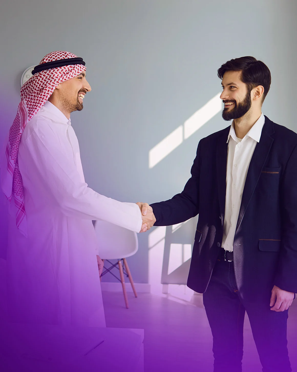 two men shaking hands
