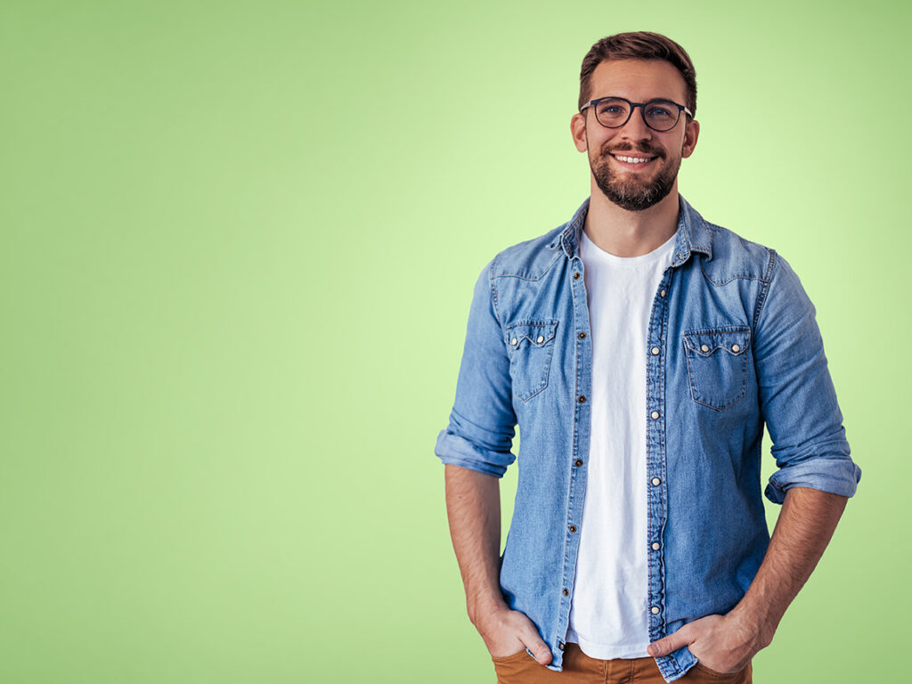 man wearing denim button down shirt