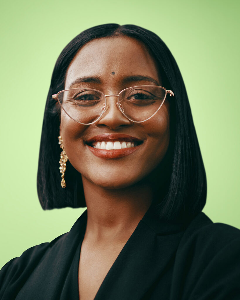 woman wearing gold glasses