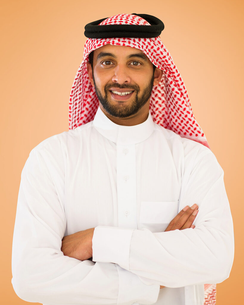 man with arms crossed smiling