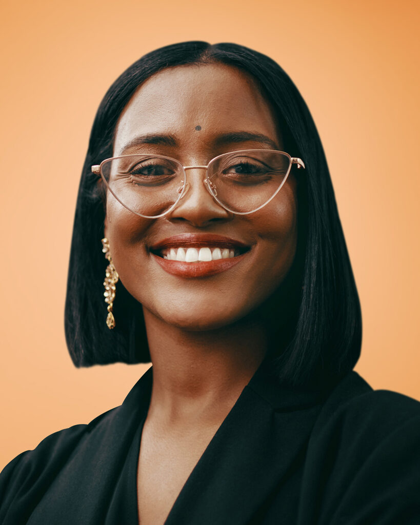 woman wearing gold glasses