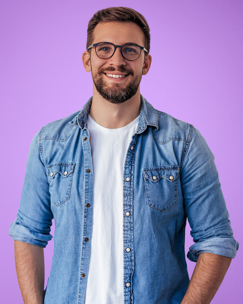 man wearing denim button down shirt