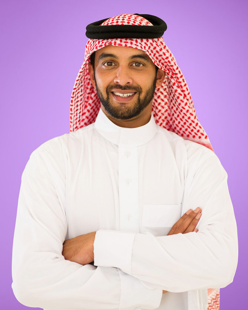 man with arms crossed smiling