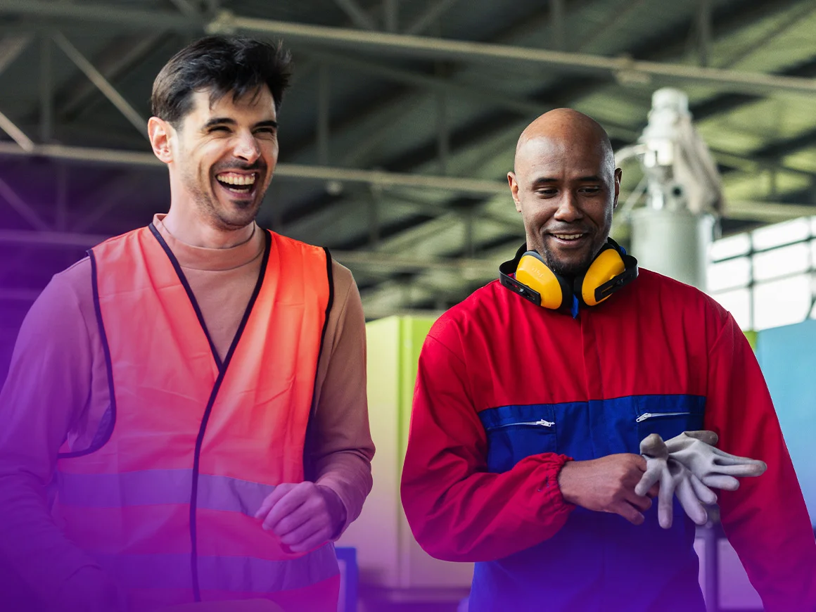 two men smiling at work