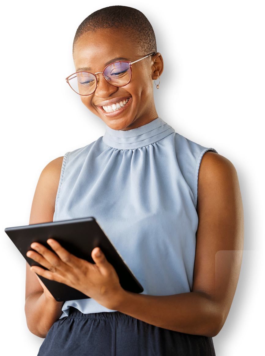 woman wearing light blue blouse looking down on tablet with a smile